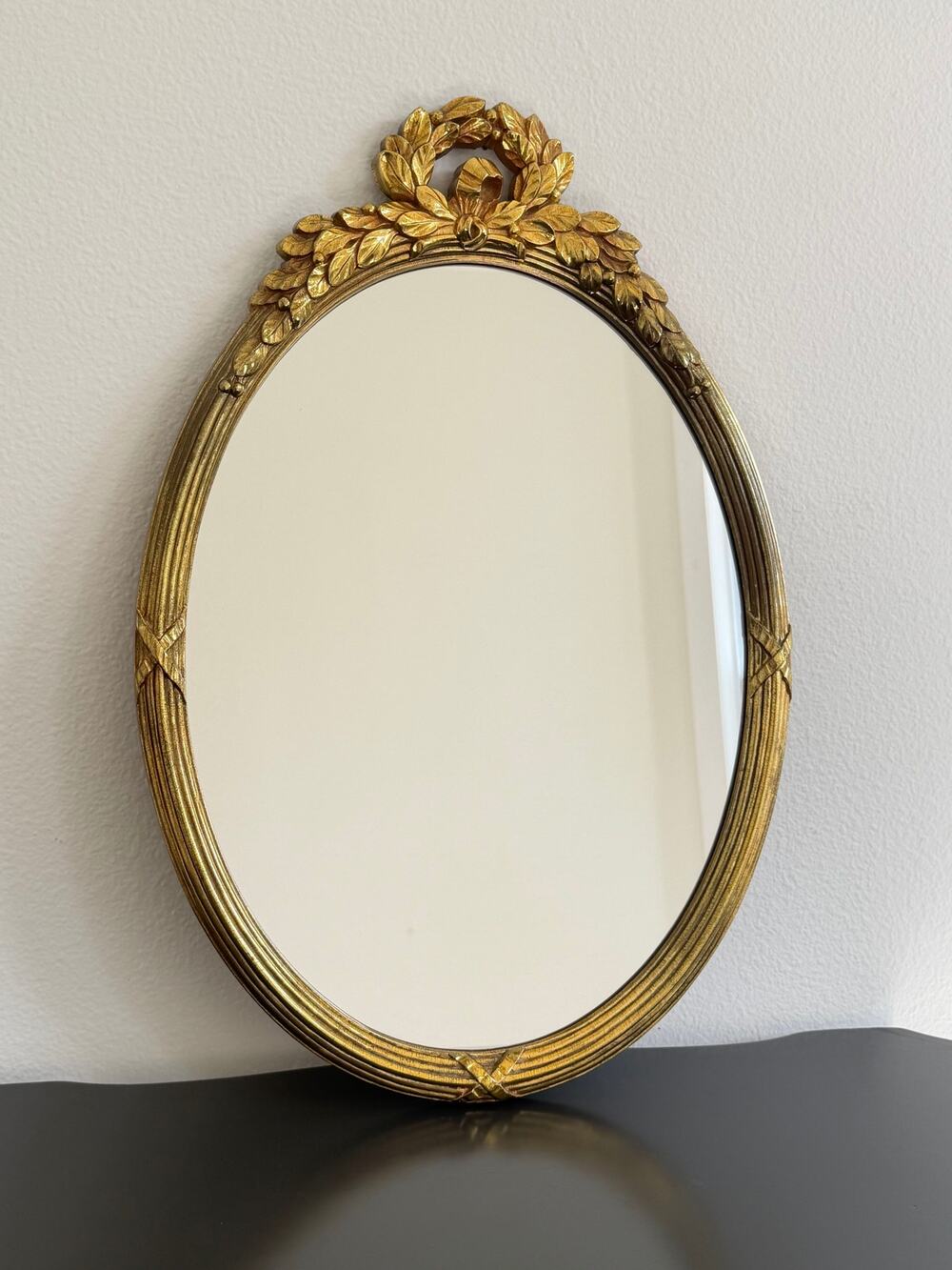 Vintage Hollywood Regency style mirror gold classic leaf wreath and ribbon crest